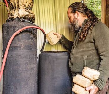 Homestead Hacks: DIY Radiant Heat with a Rocket Stove Boiler Image